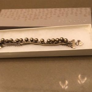 Silver retired bracelet